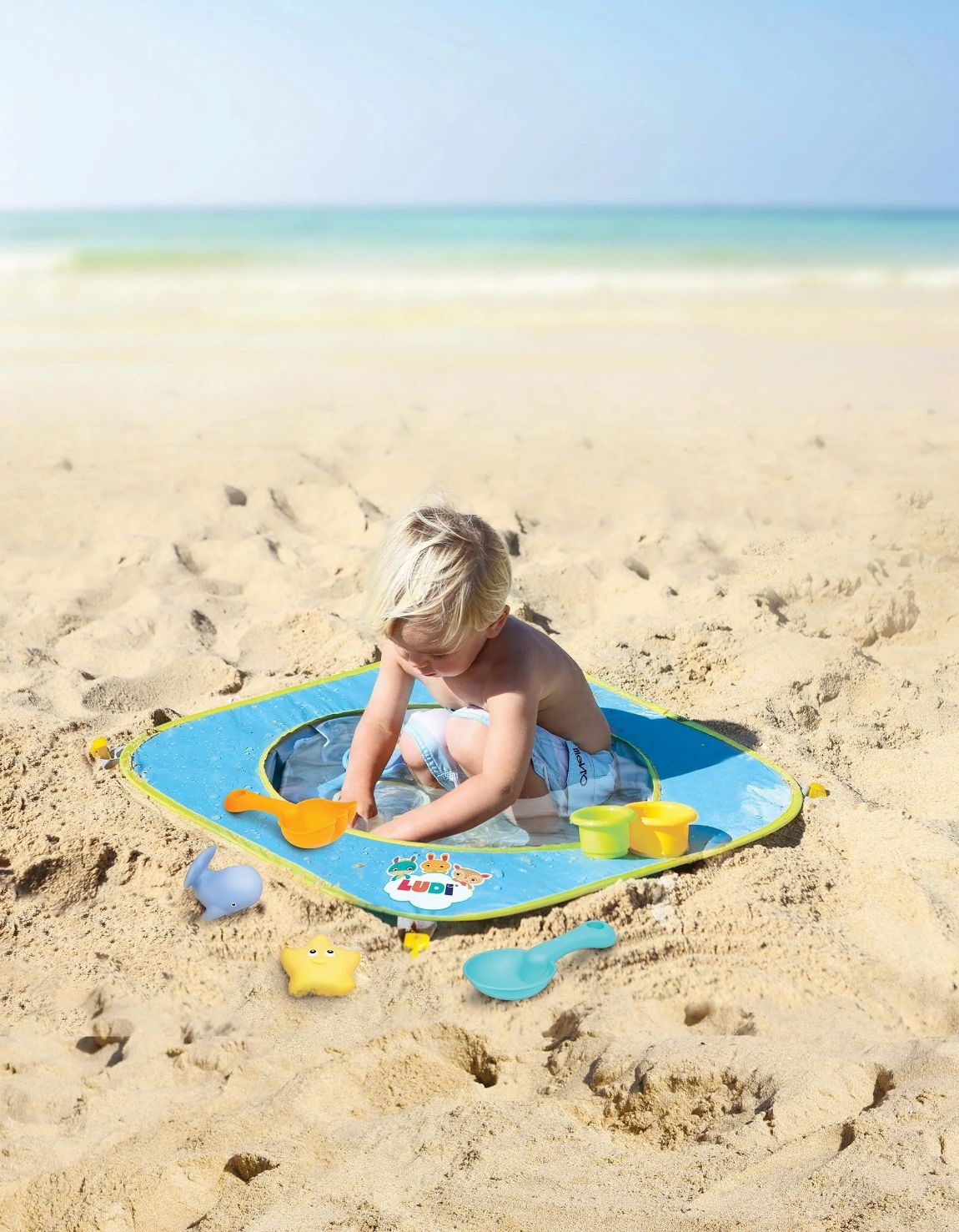 Piscinas de praia, tendas UV e babywearing para água – tudo para um verão refrescante!